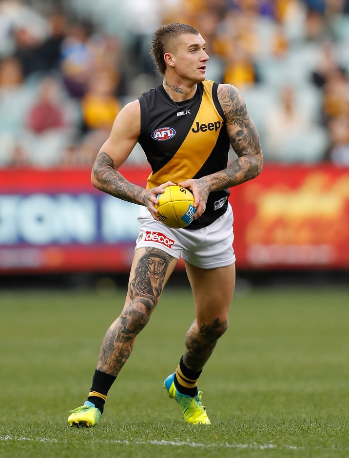 AFL 2016 Rd 18 - Hawthorn v Richmond MELBOURNE, AUSTRALIA - JULY 24: Dustin Martin of the Tigers in action during the 2016 AFL Round 18 match between the Hawthorn Hawks and the Richmond Tigers at the Melbourne Cricket Ground on July 24, 2016 in Melbourne, Australia. (Photo by Michael Willson/AFL Media)